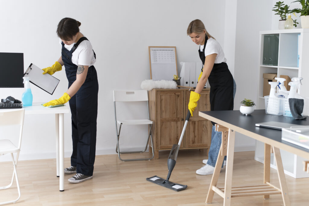 Two Maids Cleaning the room